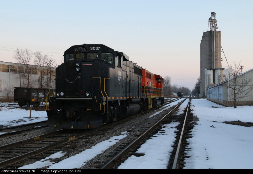 As the day comes to an end, HESR 3037 & 3038 sit tied down